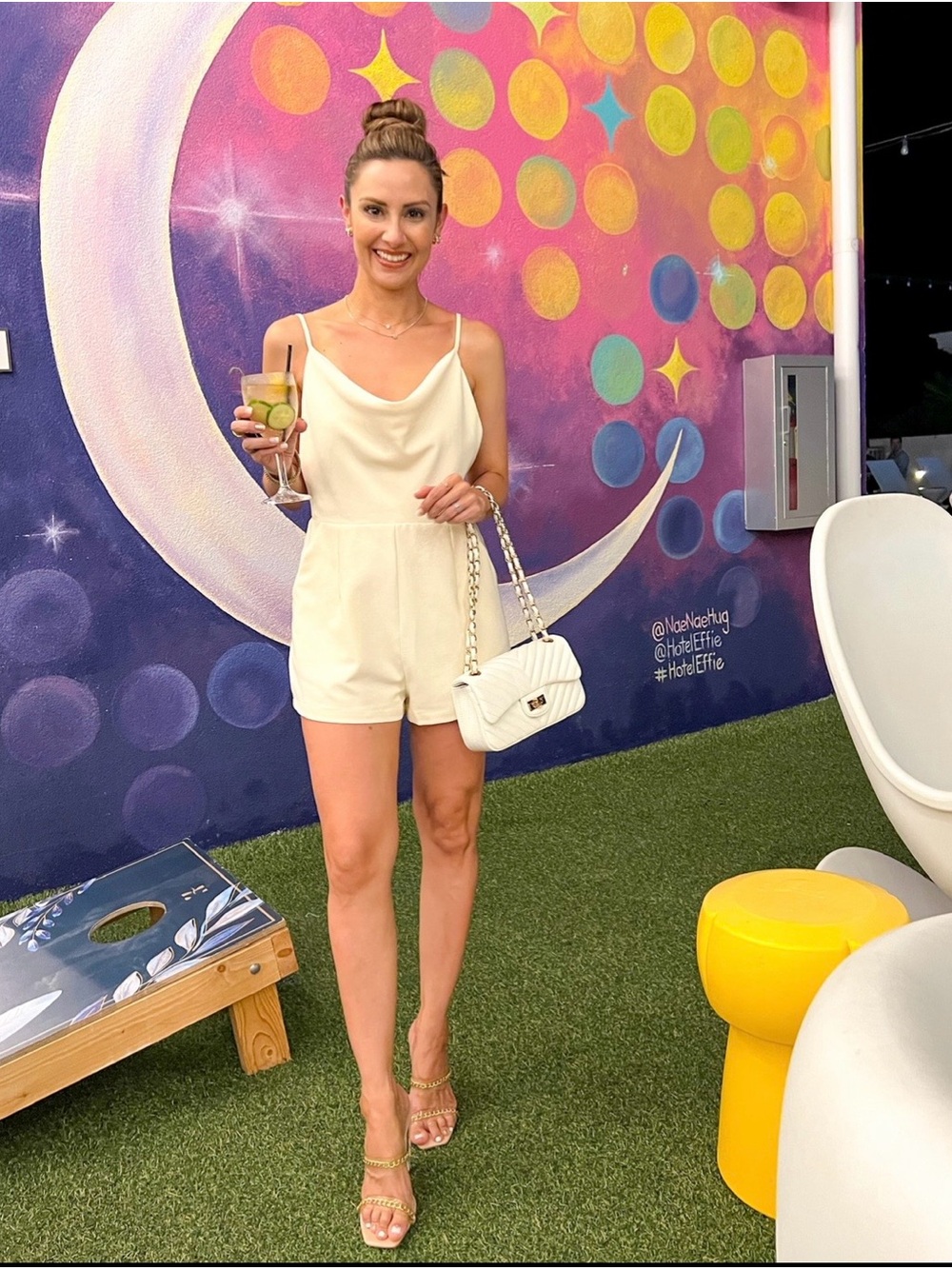 Women's Cream Cowl-Neck Short Romper. Open back.